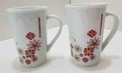 Starbucks Holiday Poinsettia White Red Gold 2 Tall Coffee Mugs 12 oz   - Sold on eBay Jan, 1st 2020 for $21.28
