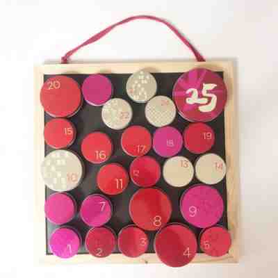 Starbucks Advent Calendar magnetic hanging board w/numbered empty tins 12.5” - Sold on eBay Dec, 25th 2019 for $18.89