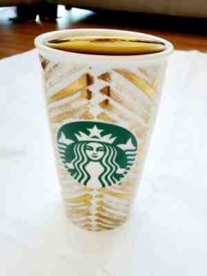 STARBUCKS 2015 Gold Ceramic  Double Wall Travel Mug Coffee Cup 12 fl - Sold on eBay Jan, 22nd 2020 for $18.00