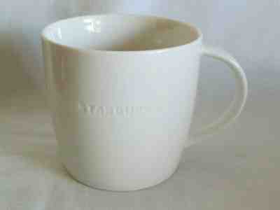 Starbucks 2011 New Bone China Embossed Logo Coffee Mug NEW - Sold on eBay Jan, 28th 2020 for $19.99
