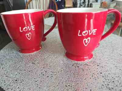 Lot of Two Starbucks 2006 Red LOVE Coffee Mug Cup Footed 15 ounce - Sold on eBay Feb, 1st 2020 for $35.00