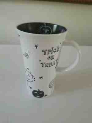 Starbucks Halloween Coffee Tea Mug Cup 14 oz 2007 Black & White Handle Pumpkin - Sold on eBay Jul 10, 2021 for $8.50