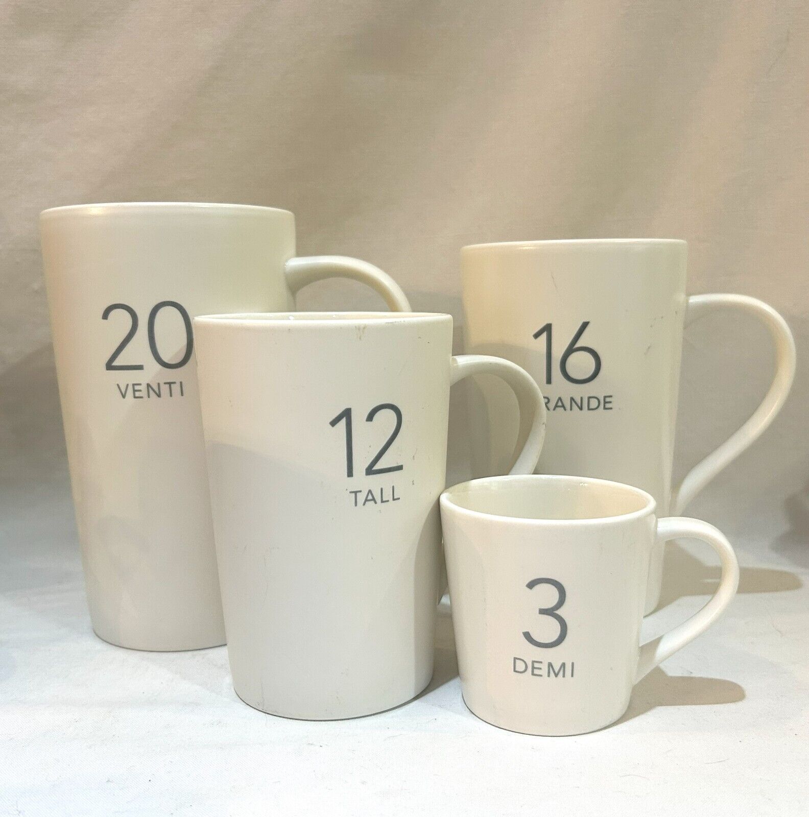 Lot of 4 Starbucks Mugs 2011 Matte White Ivory 20 Venti 16 Grande 12 Tall 3 Demi - Sold on eBay March 1st, 2025 for $80.00