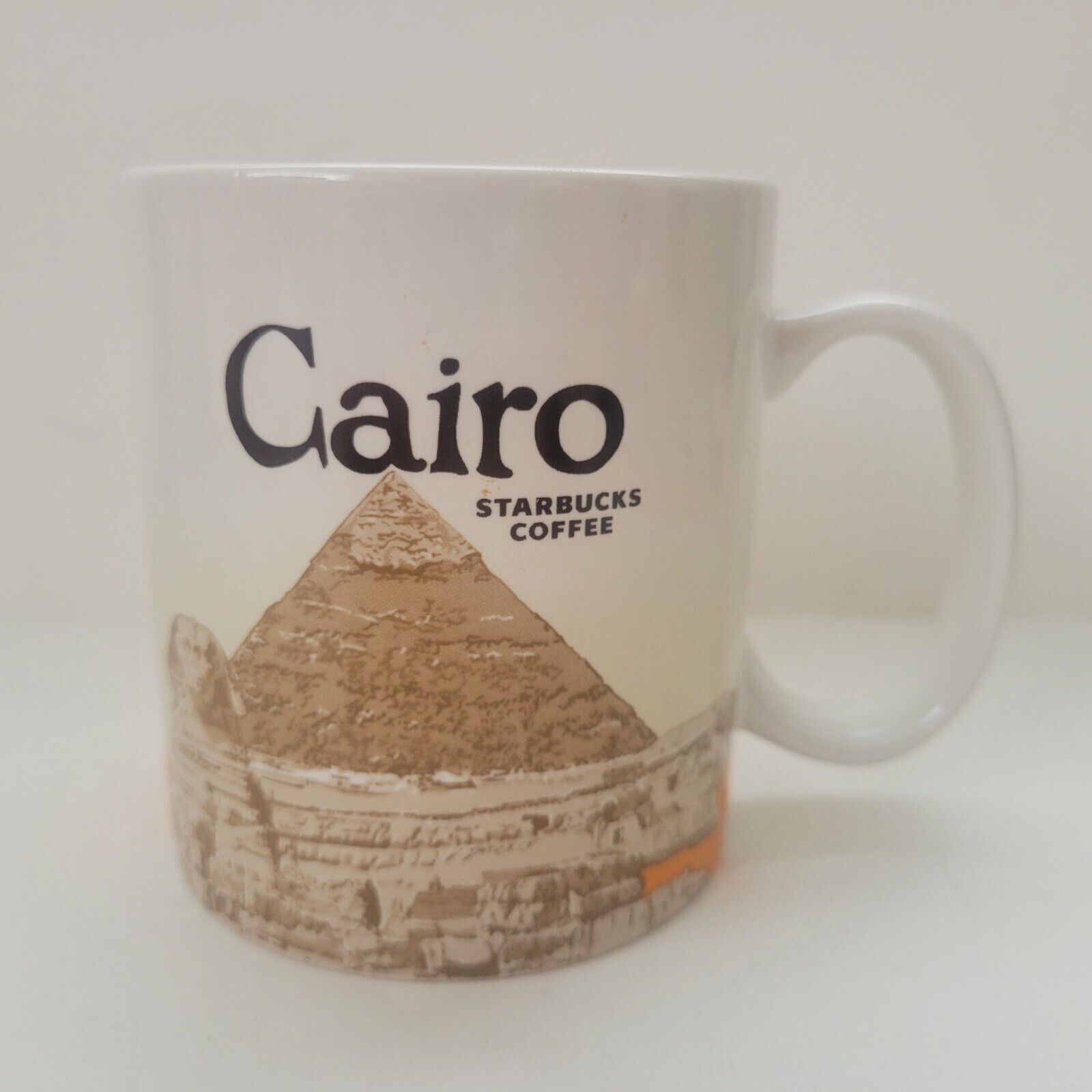 Starbucks NWT Cairo Egypt Global Icon 2016 mug cup Orange Original Pyramids - Sold on eBay December 21st, 2024 for $149.95 (1 bids) 