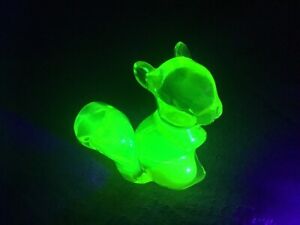 Fenton Topaz Squirrel Vaseline count colored uranium glass. Very collectible.