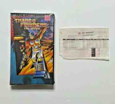 TRANSFORMERS THE MOVIE (1995) SEALED CLAMSHELL VHS. ORIGINAL PURCHASE RECEIPT!!!