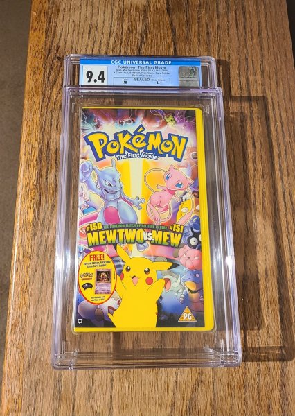 Pokemon: The First Movie CGC 9.4 Seal Grade A+ VHS W/ Game Card Warner U.K. 2000