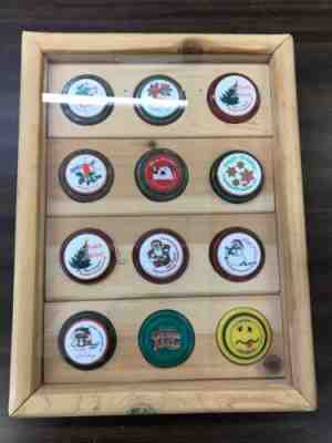 lot of 12 russell promotional yo-yos in nice frame christmas disney coke etc