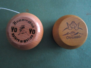 Two Hummingbird wooden yoyos, one beginners