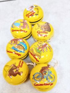 7 Curious George Tin Yoyos