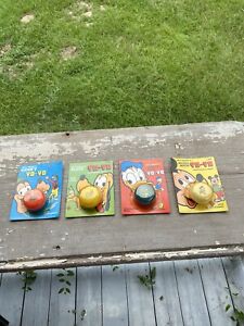 VINTAGE LOT OF 4 NOS SEALED WALT DISNEY YO-YOS MICKEY MOUSE GOOFY PLUTO DONALD